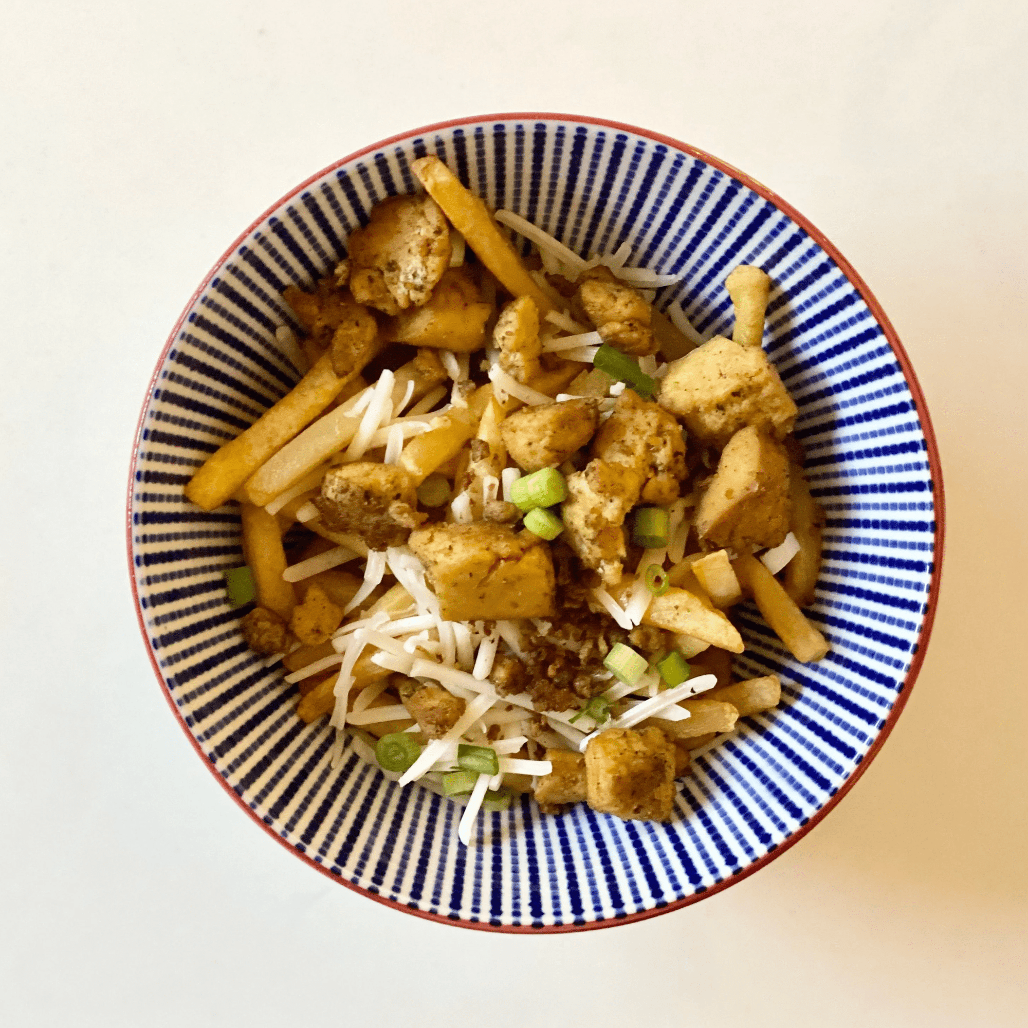 Cognac-Spiked Vegan Poutine with Wild Mushroom Gravy & Chickenless Tofu