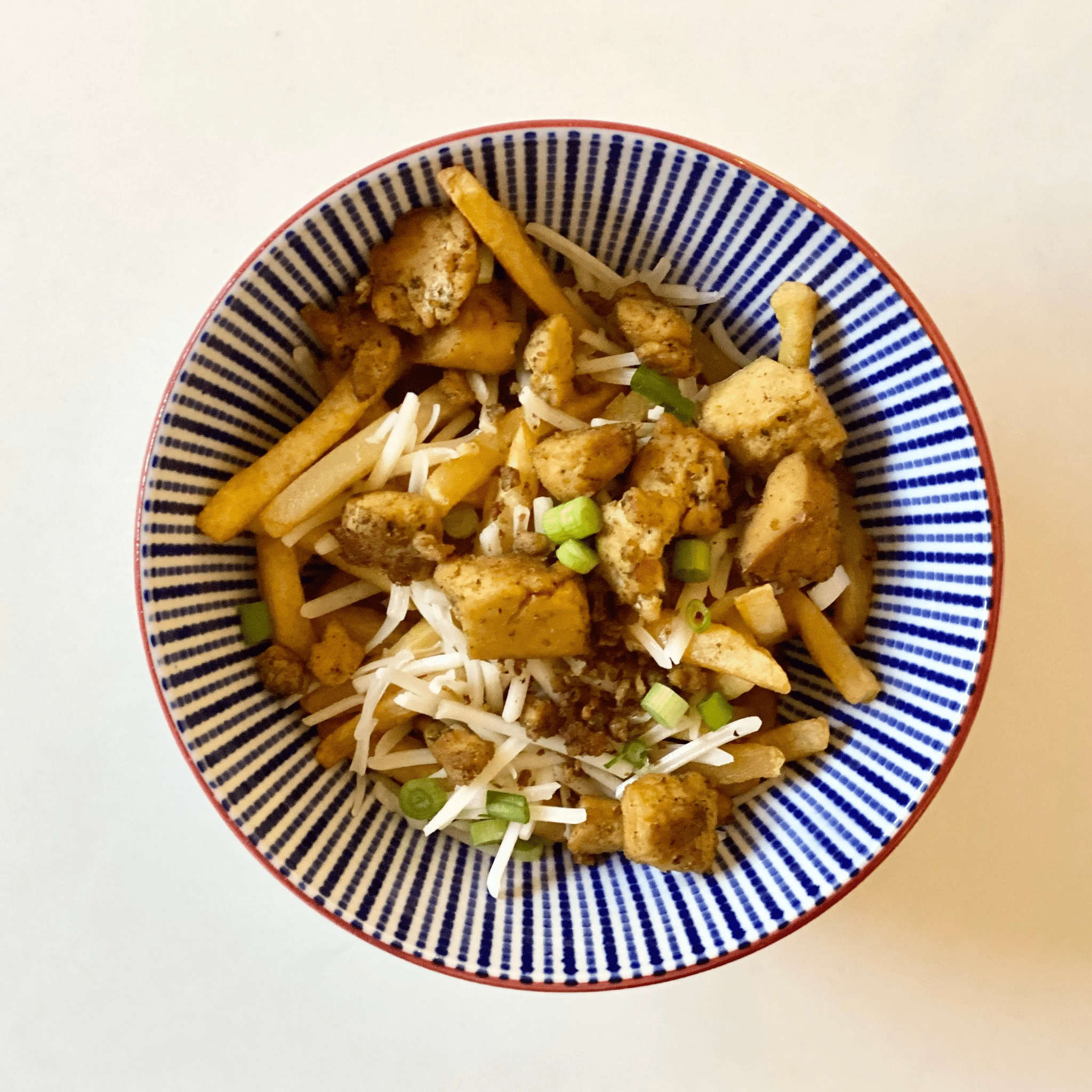 Cognac-Spiked Vegan Poutine with Wild Mushroom Gravy & Chickenless Tofu
